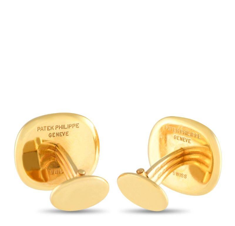 These Patek Philippe Calatrava cufflinks will add a touch of class to any suited ensemble. At the center, the brand’s iconic decorative motif elevates the minimalist design. Each one is crafted from 18K Yellow Gold and measures 0.75” long by 0.85”