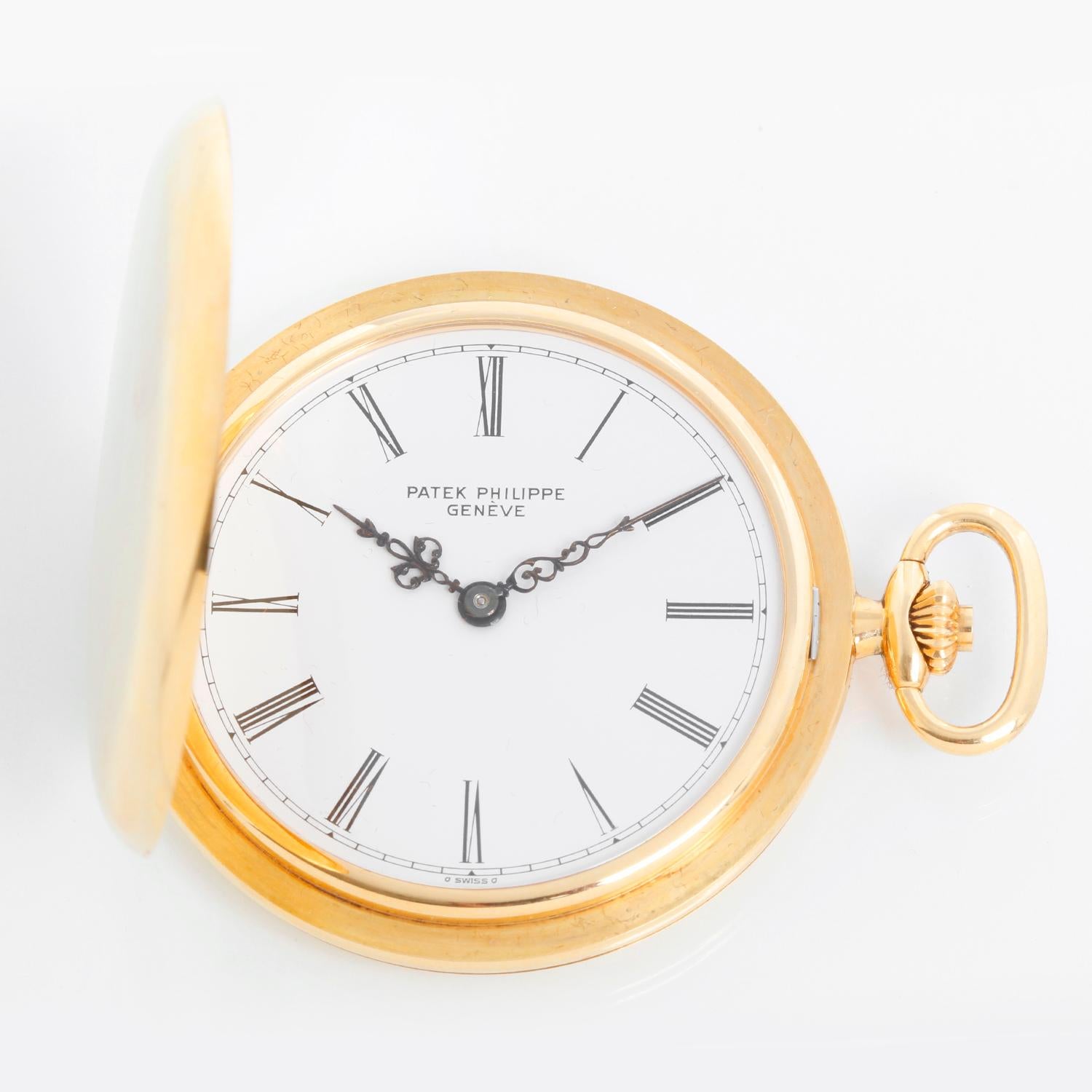 Patek Philippe 18K Yellow Gold Hunter Case Pocket Watch Ref 865 - Manual winding. 18K Yellow gold (48 mm) . White enamel dial with skinny roman numerals.  Ref. 865 was produced from 1969 until the early 1990s. With patek box.