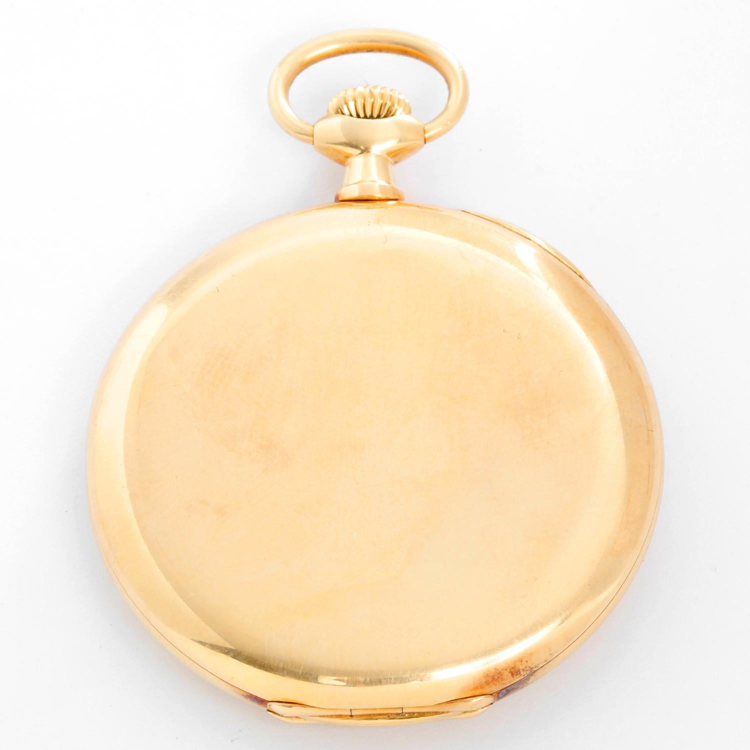 Patek Philippe 18K Yellow  Gold Pocket Watch - Manual winding. 18K Yellow gold case ( 45 mm ). Champagne guilloche dial with accentuated Arabic numerals; subdial at 6 o'clock. Pre-owned with custom box. Circa 1940's.