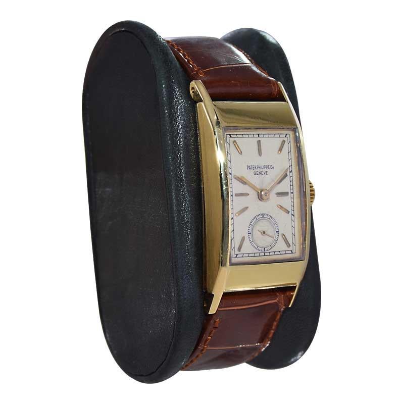 FACTORY / HOUSE: Patek Philippe & Co.
STYLE / REFERENCE: Art Deco Tank Style / Reference 425
METAL / MATERIAL: 18Kt. Yellow Gold 
CIRCA / YEAR: 1948-49
DIMENSIONS / SIZE: Length 43mm x Width 20mm
MOVEMENT / CALIBER: Manual Winding / 18 Jewels / Cal.