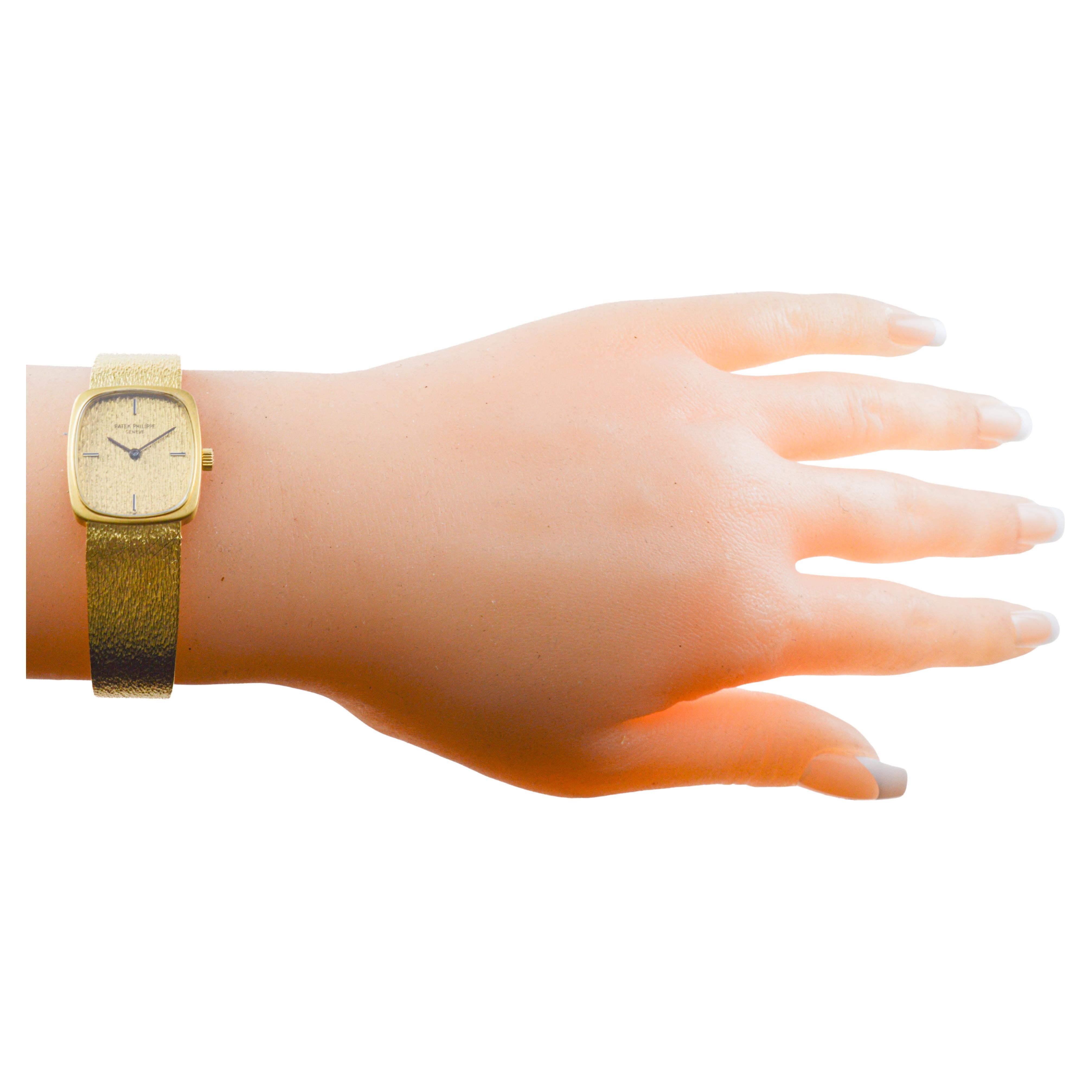Modernist Patek Philippe 18Kt Solid Gold Dress Watch circa 1980's with Original Bracelet For Sale