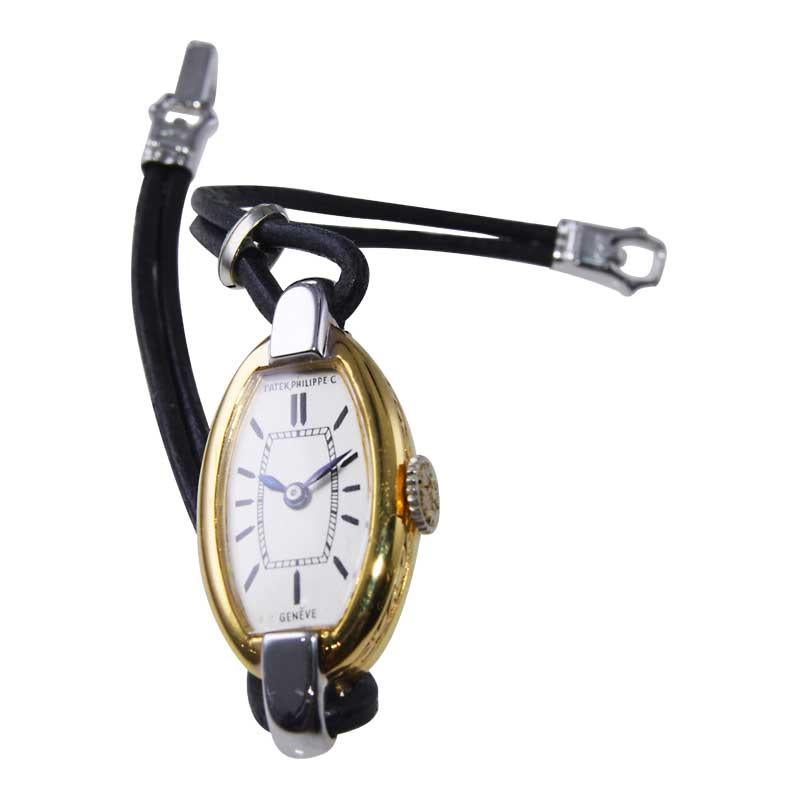 Patek Philippe 18Kt. Handgefertigte zweifarbige Uhr aus Gelb- und Weißgold aus dem Jahr 1927 5
