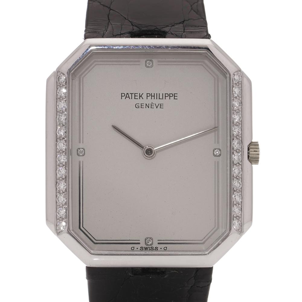 Patek Philippe 18kt white gold with diamonds.
Ref: 3894
1990's

Reference Number: 3894
Case Diameter: 28 mm
Movement: Quartz
Dial colour: Silver
Case Material: 18kt. Gold
Bezel material: white gold and diamonds
Watchband Material: Leather
Clasp: