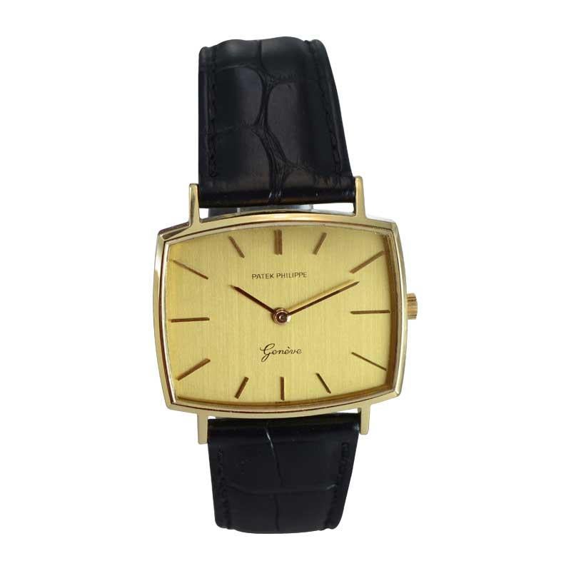 FACTORY / HOUSE: Patek Philippe & Cie.
STYLE / REFERENCE: Cushion Shape / REf. 3527
METAL / MATERIAL: 18kt Yellow Gold
CIRCA / YEAR: 1960's
DIMENSIONS / SIZE: Length 33mm x Diameter 34mm
MOVEMENT / CALIBER: Manual Winding / 18 Jewels / Cal.