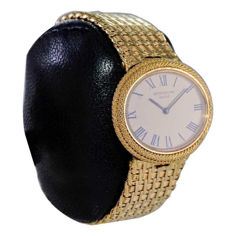 FACTORY / HOUSE: Patek Philippe & Co.
STYLE / REFERENCE: Oval Bracelet Dress Style / Reference 4290
METAL / MATERIAL: 18Kt. Solid Yellow Gold
CIRCA / YEAR: 1980's
DIMENSIONS / SIZE: Length 32mm X Diameter 26mm
MOVEMENT / CALIBER: Manual Winding / 18