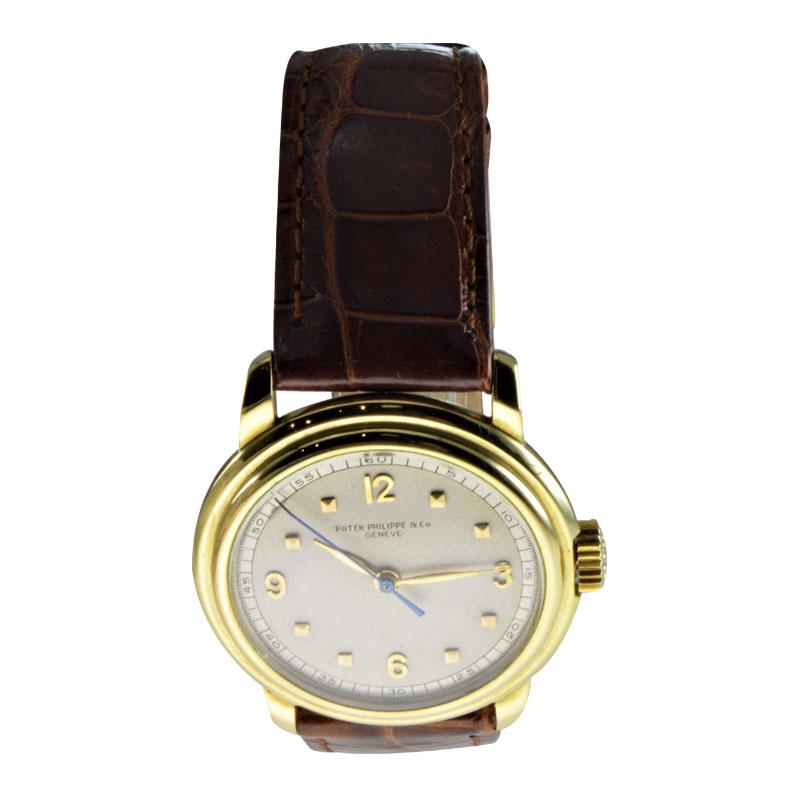 Women's or Men's Patek Philippe 18 Karat Gold Watch with a Custom Case and Archival Document