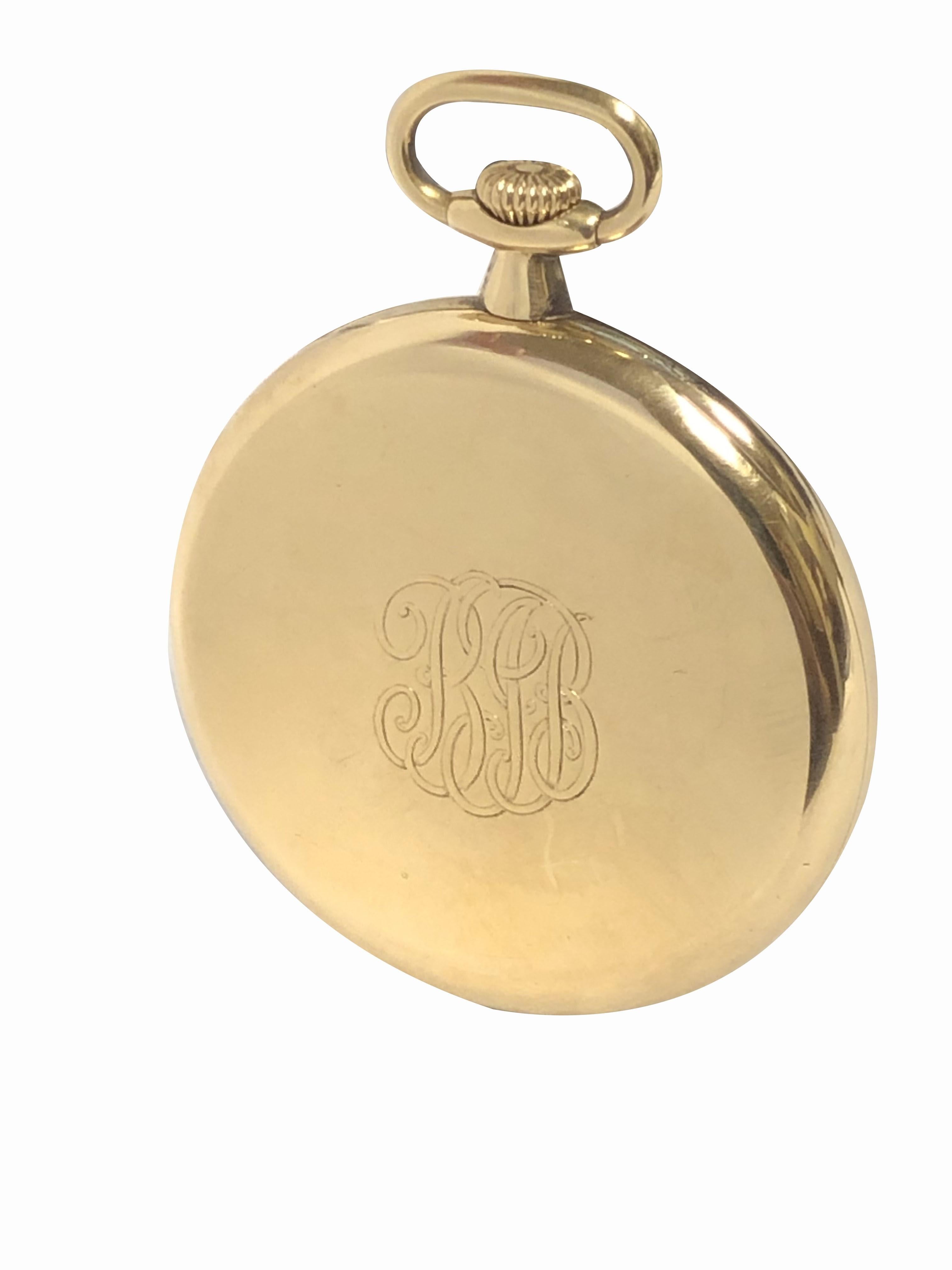 Circa 1920s Patek Philippe Pocket Watch retailed by Spaulding & Company, 47 M.M. 18K Yellow Gold 3 Piece case with inside Movement Dust cover,  20 Jewel mechanical, manual wind nickle lever movement. Porcelain dial with sub seconds chapter and