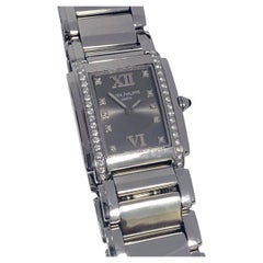 Patek Philippe "24" Montre-bracelet à quartz pour dames en acier et diamants