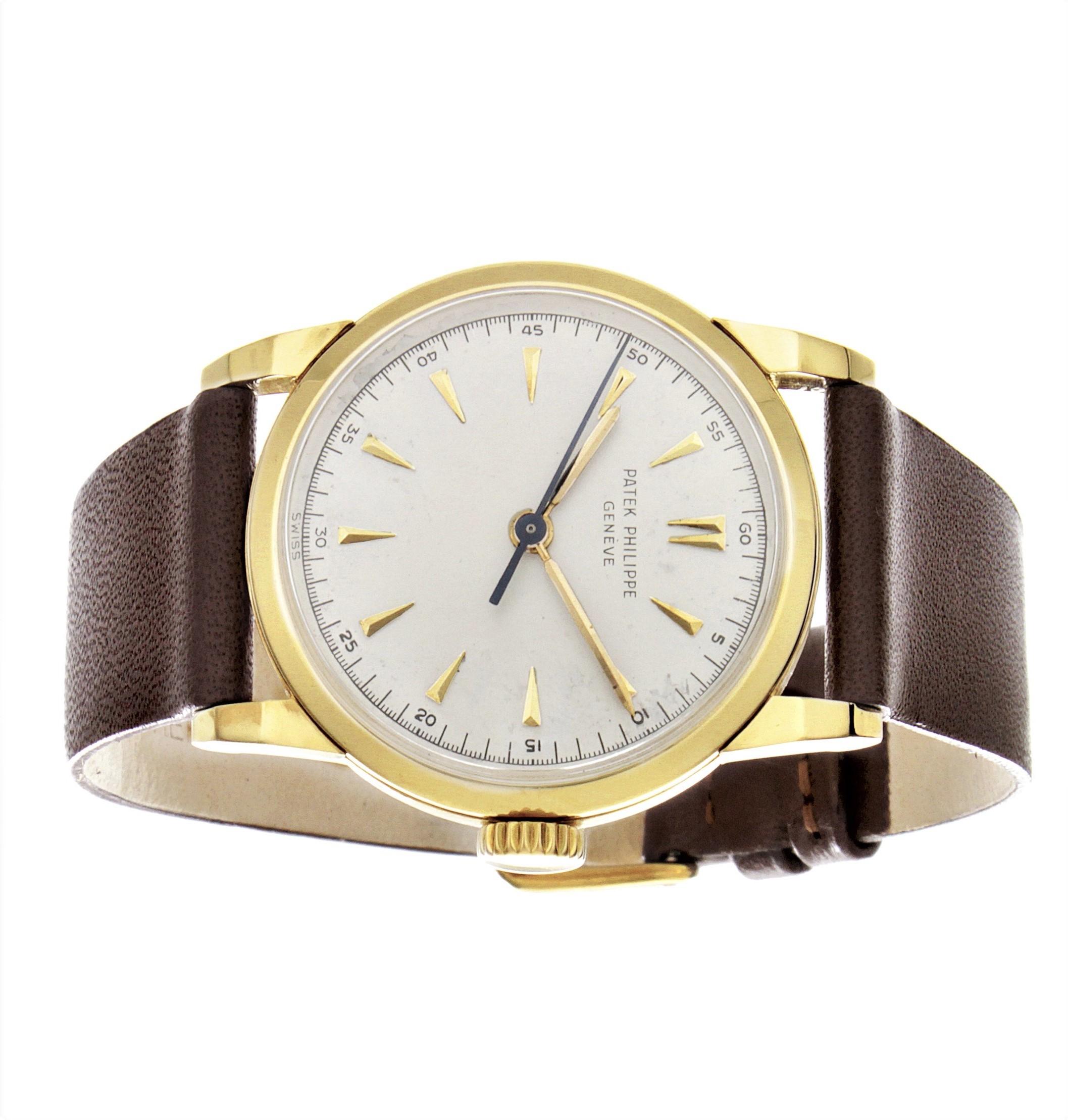 Introduction:  Patek Philippe 2460J, Vintage Calatrava made in 18K yellow gold, and measuring 32 mm in diameter, with a 3-body case, with wide heavy faceted lapped lugs, original crown and dial.  The watch is fitted with an 27 SC caliber center