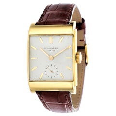 Patek Philippe 2479J Curved Domed Rectangular Watch with Stepped Case Circa 1950