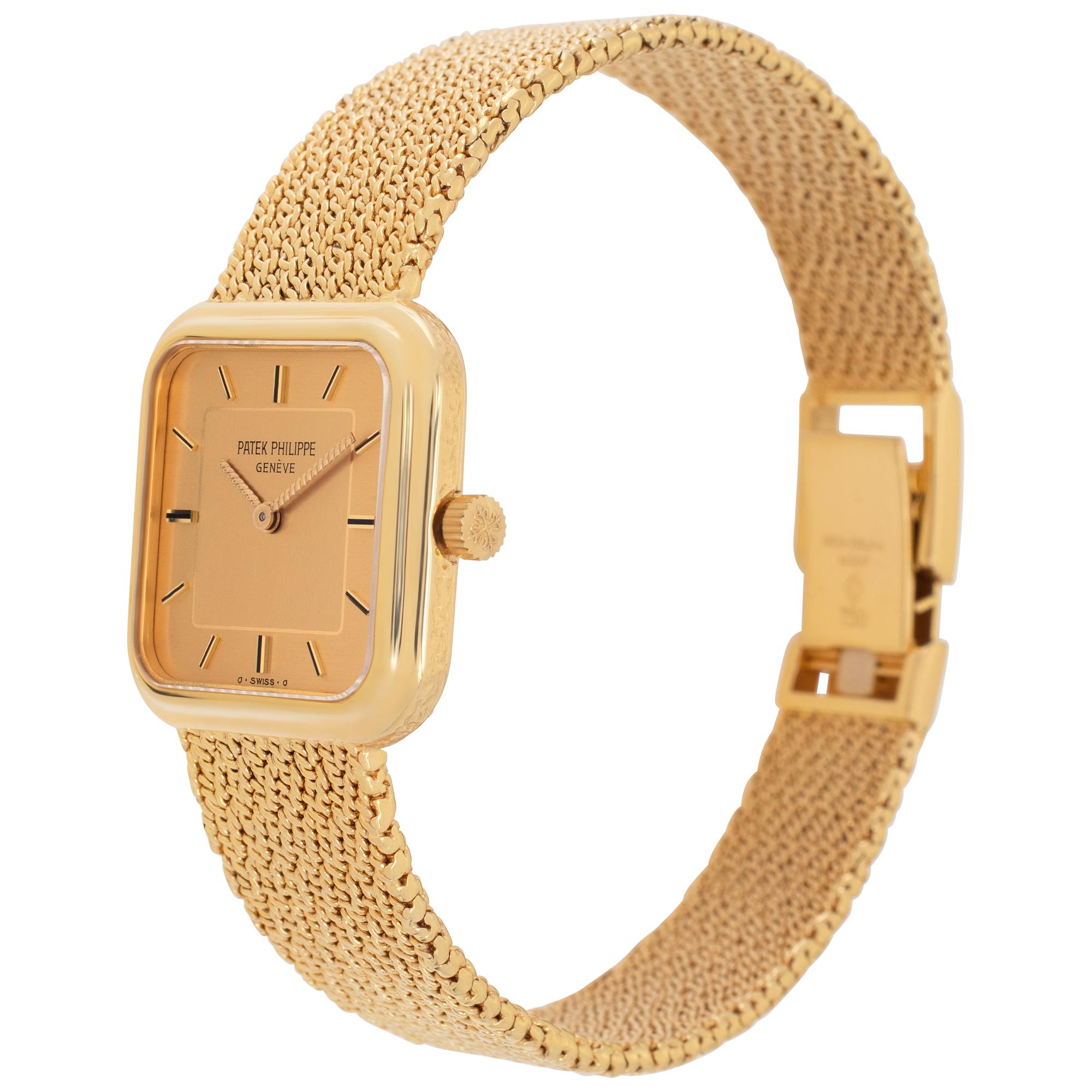 Vintage Patek Philippe in 18k yellow gold on an 18k mesh bracelet. Quartz. 24 mm case size. Will fit up to a 6.75 inch wrist size. Ref 4456-2. Fine Pre-owned Patek Philippe Watch. Certified preowned Vintage Patek Philippe 4456-2 watch is made out of