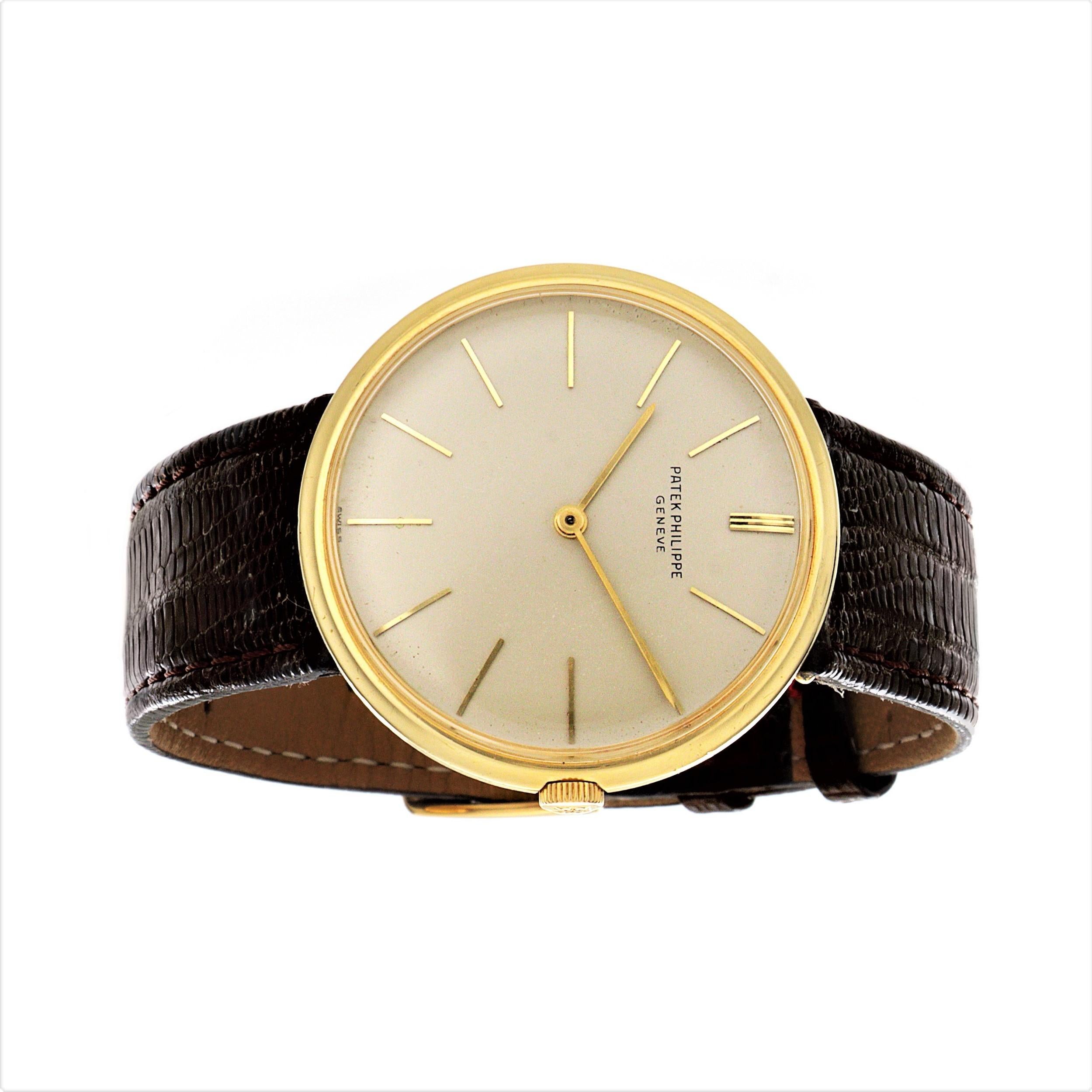 Introduction:
Patek Philippe 2591J Calatrava.  The watch is made in 18 Karat yellow gold and measures 35mm.  The watch was made in the mid 1962, it comes with a silver cream dial, raised gold hour markers.  The watch is fitted with a 23-300 18-jewel