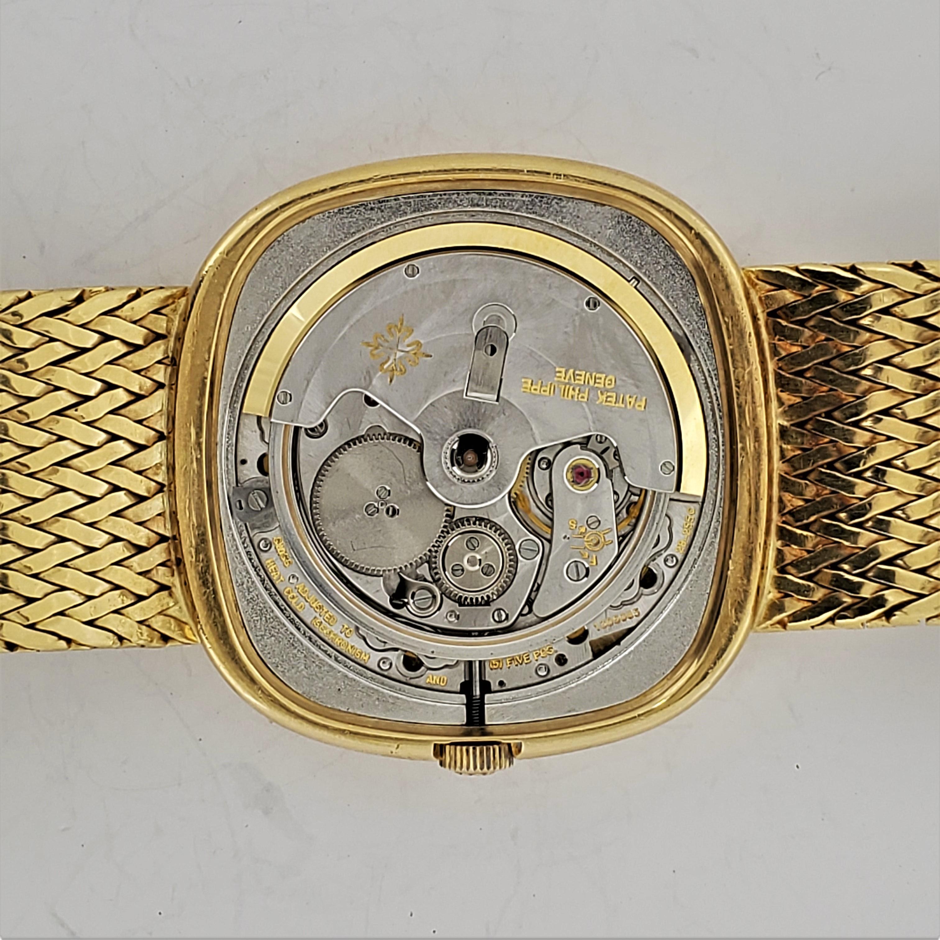 Contemporary Patek Philippe 3604/2 Cushion Shape Automatic Gold Bracelet Watch, 1977 For Sale