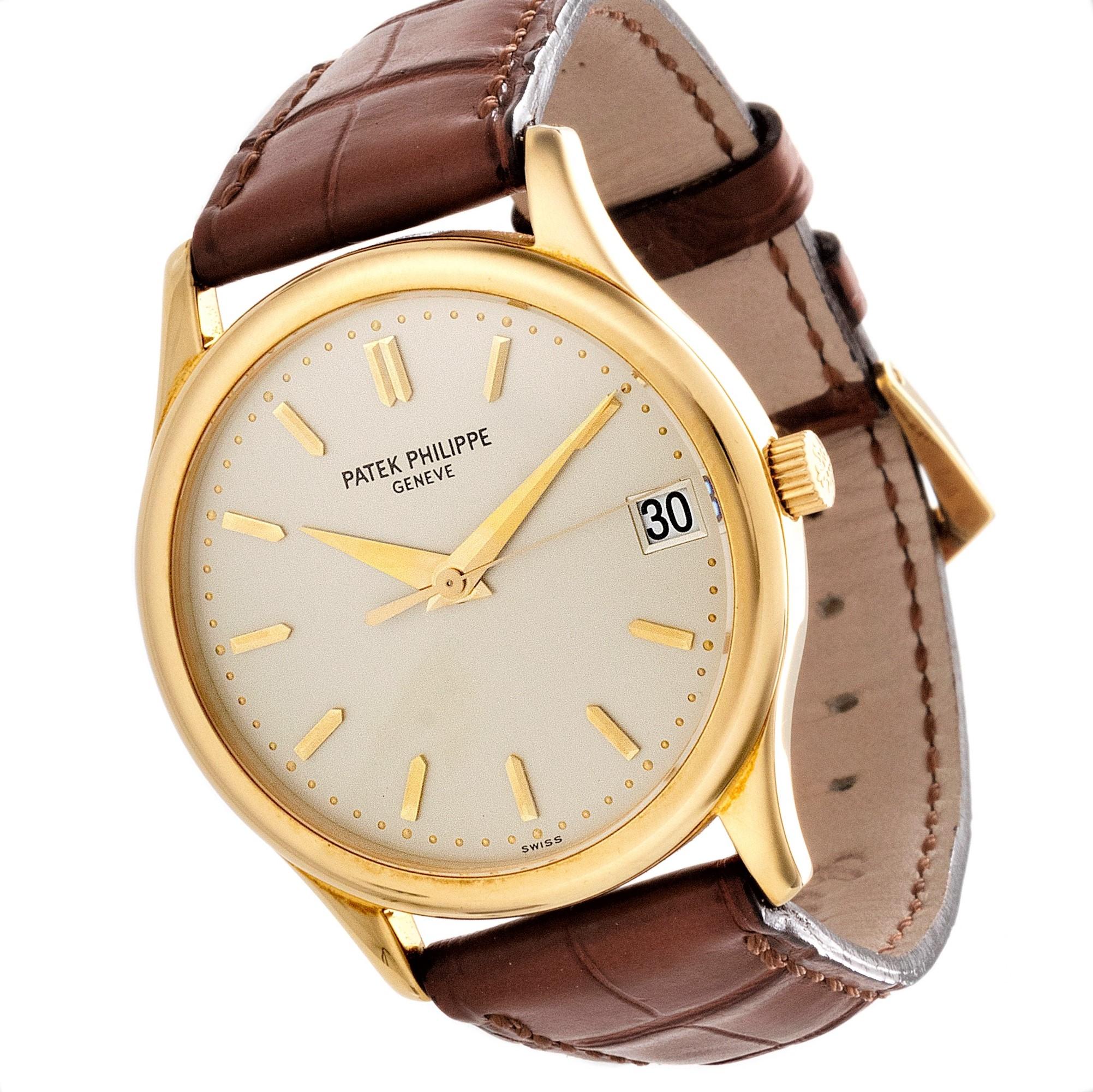 This 3998J Calatrava Patek Philippe watch features a 315 SC Automatic winding movement with date and new Patek alligator strap with original 18K yellow gold Patek buckle.  The watch is further accompanied with its original certificate of