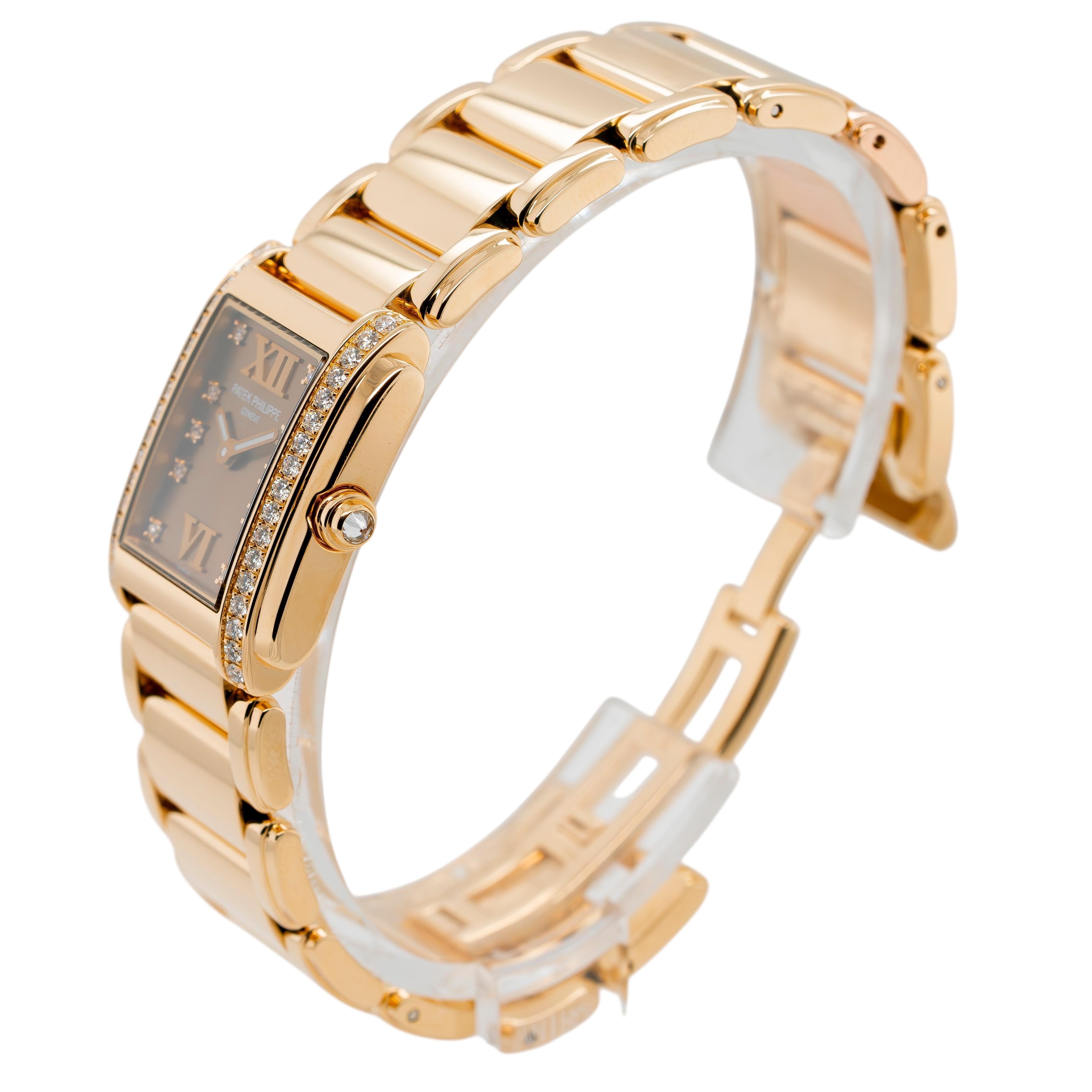 The Patek Philippe Twenty-4 epitomizes timeless elegance and refined craftsmanship. Encased in luxurious 18k rose gold, this ladies' watch is adorned with a stunning 0.48-carat diamond bezel, adding a touch of brilliance to its sophisticated design.