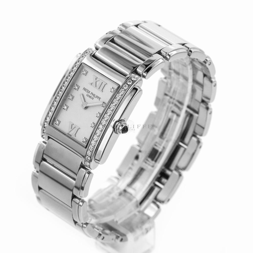 Contemporary Patek Philippe 4910/10A-011 Steel Twenty-4 Diamond 24 4910 Quartz Ladies Watch For Sale