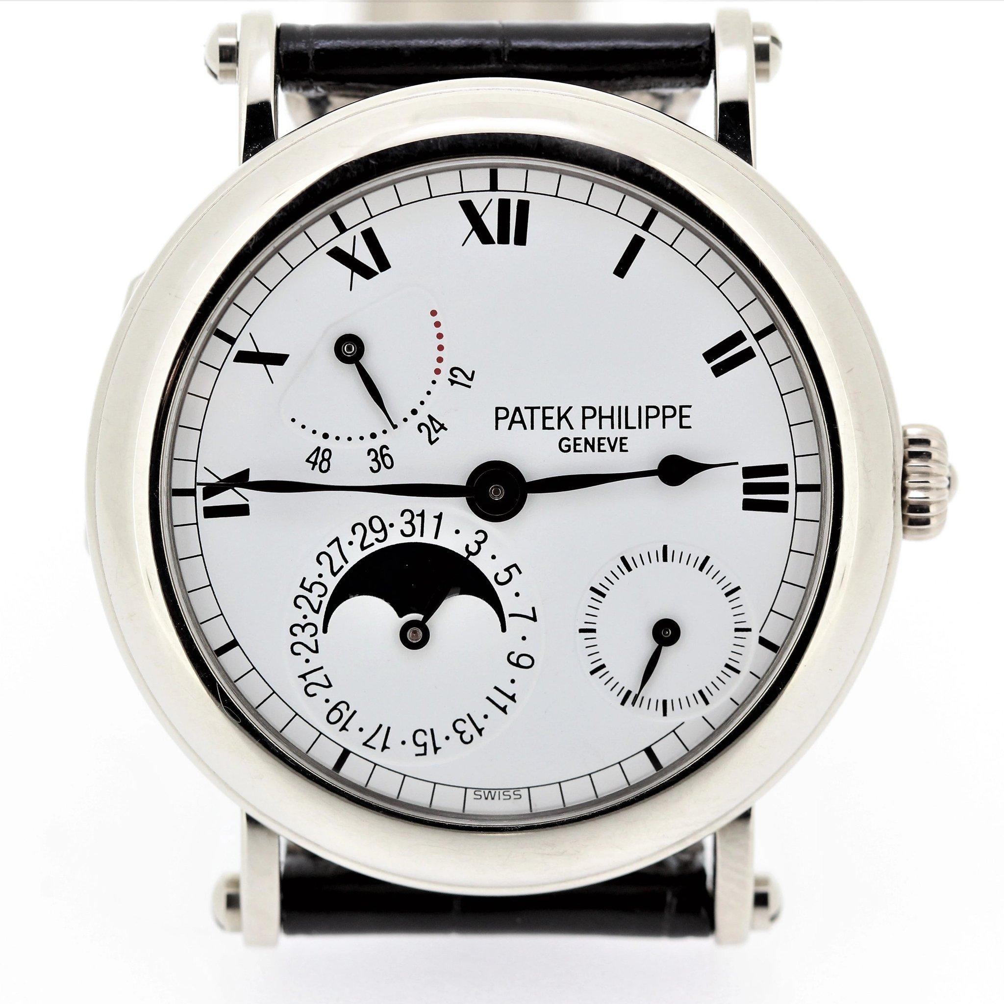 Introduction:

Patek Philippe 5054G-001 Hinged back officers case. This complicated automatic watch, measures 36 mm, and is fitted with an Automatic Calendar, 240 PS IRM LU movement # 3165595 / 4127942.  Further the watch is accompanied with its