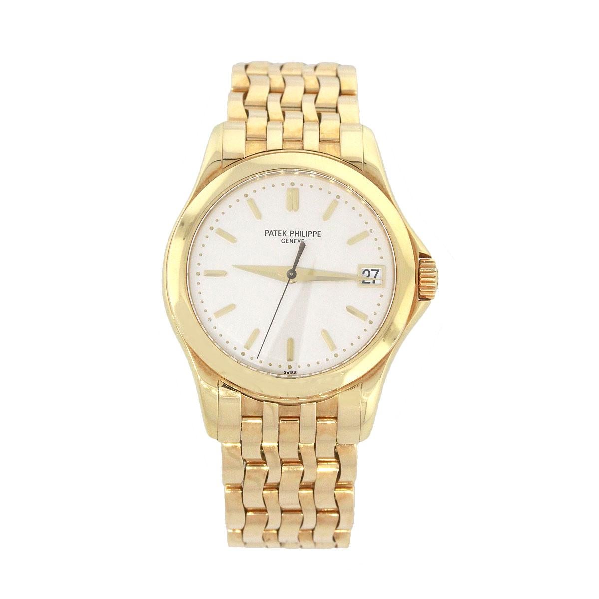 Brand: Patek Philippe
MPN: 5107J
Model: Calatrava
Material: 18k Yellow Gold
Dial: White Dial with gold hands and stick markers, date can be found at 3 O’Clock.
Bezel: Smooth 18k yellow gold bezel
Case Measurements: 37mm
Bracelet: 18k Yellow gold