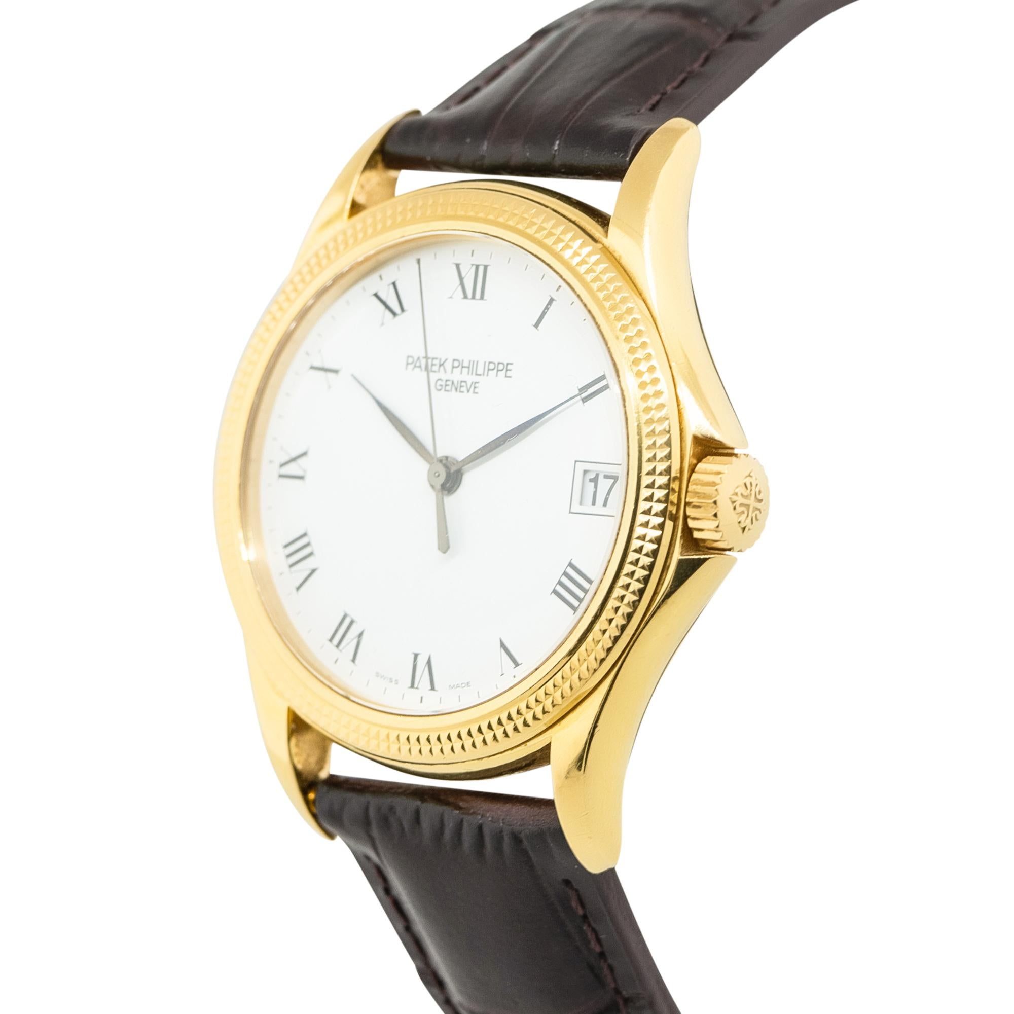 Brand: Patek Philippe
Style: Calatrava
Case Material: 18k Yellow Gold
Bezel: 18k Yellow Gold
Dial: White Dial with Black Roman Numerals. Date can be found at 3 o'clock
Bracelet: Brown Leather Bracelet with Patek Buckle
Case Diameter: 37mm
Crystal: