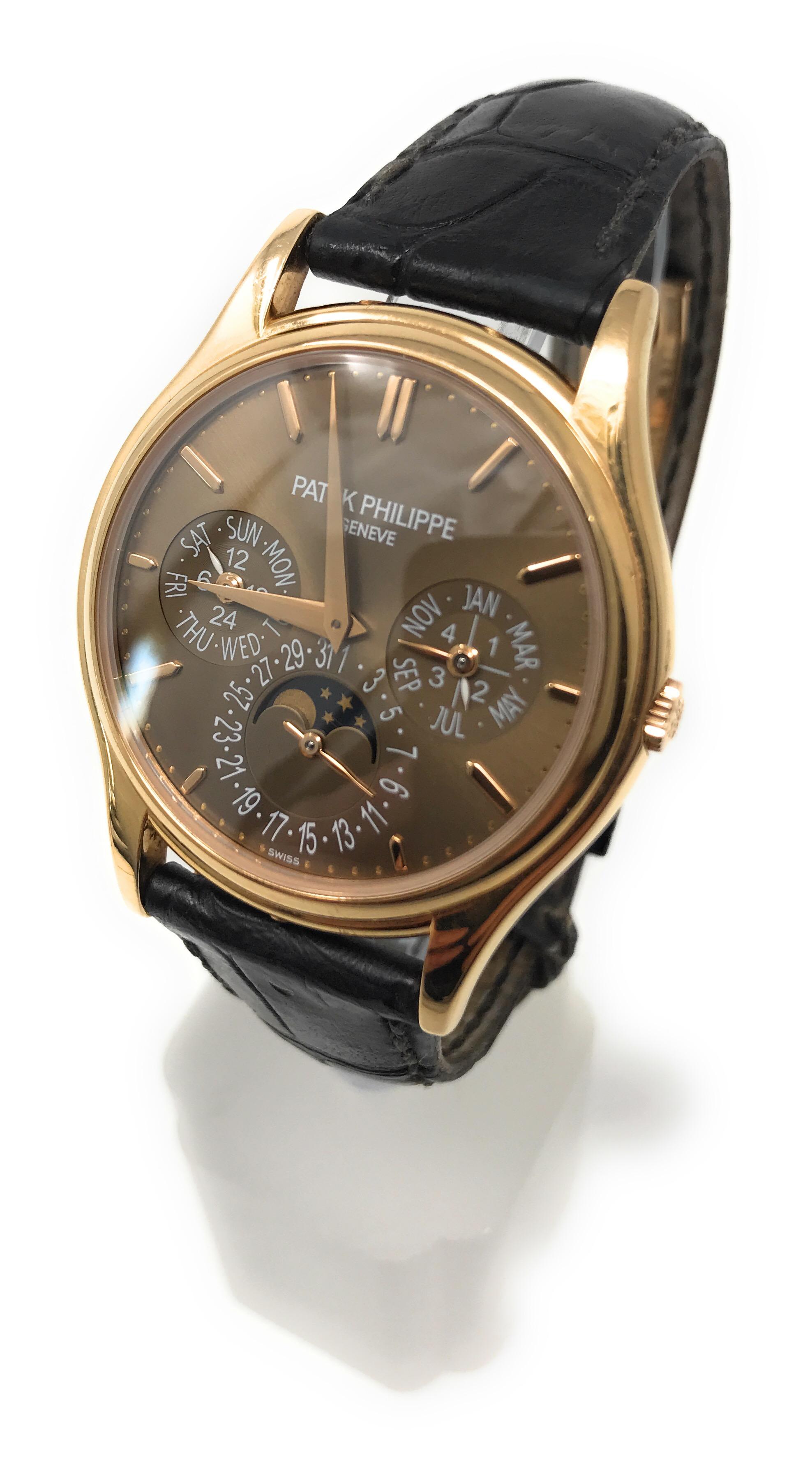 Patek Philippe Grand Complications Perpetual Calendar Men’s watch
Reference # 5140R-001
Movement: Mechanical, self winding
Case size: 37.3mm
Case shape: Round
Case material: 18 Karat Rose Gold 
Case back: Skeleton 
Dial color: Brown