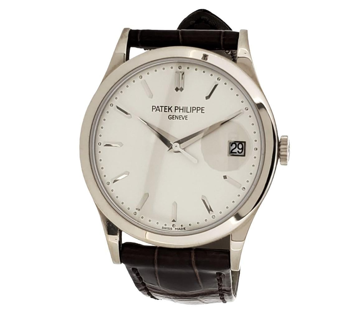 Introduction:

Patek Philippe 5296G-010 Automatic Calatrava watch, measuring 38mm and made in 18K White gold.  The watch is fitted with a 324 SC caliber 29-jewel automatic movement # 5804511, case # 6003430.  The watch has a silver dial with date at