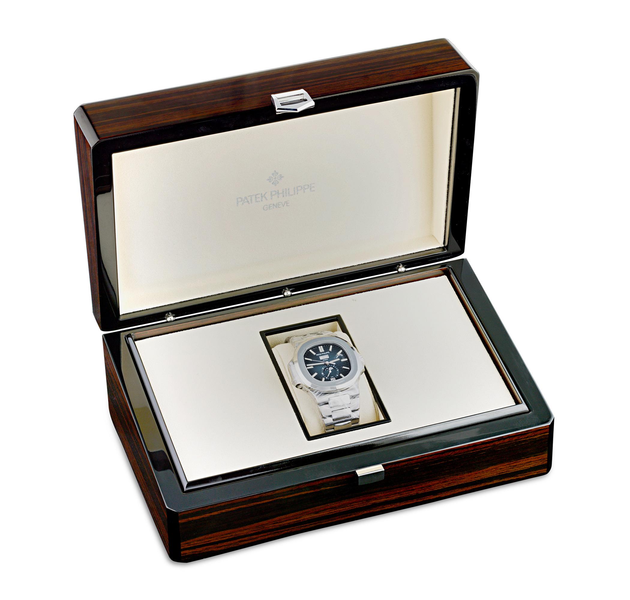 This exceptionally rare Patek Philippe Nautilus watch epitomizes the pinnacle of luxury sports watches with its Annual Calendar and moon-phase display. Originally conceived by the visionary watchmaker Gérald Genta in 1976, the Nautilus model 5726