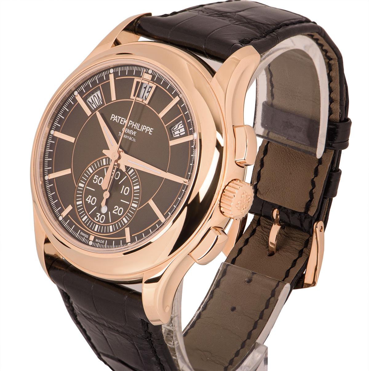 An Unworn 18kRose Gold 42mm Complications Annual Calendar Men's Wristwatch, the double name Tiffany & Co.brown sunburst dial gradually grading to black, applied hour markers, the month between 1 and 20'clock, small seconds with day/night indication