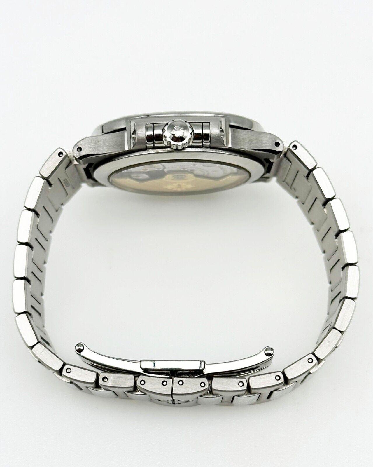 Patek Philippe 7118/1A-010 Ladies Nautilus Caja de acero inoxidable Papel 6