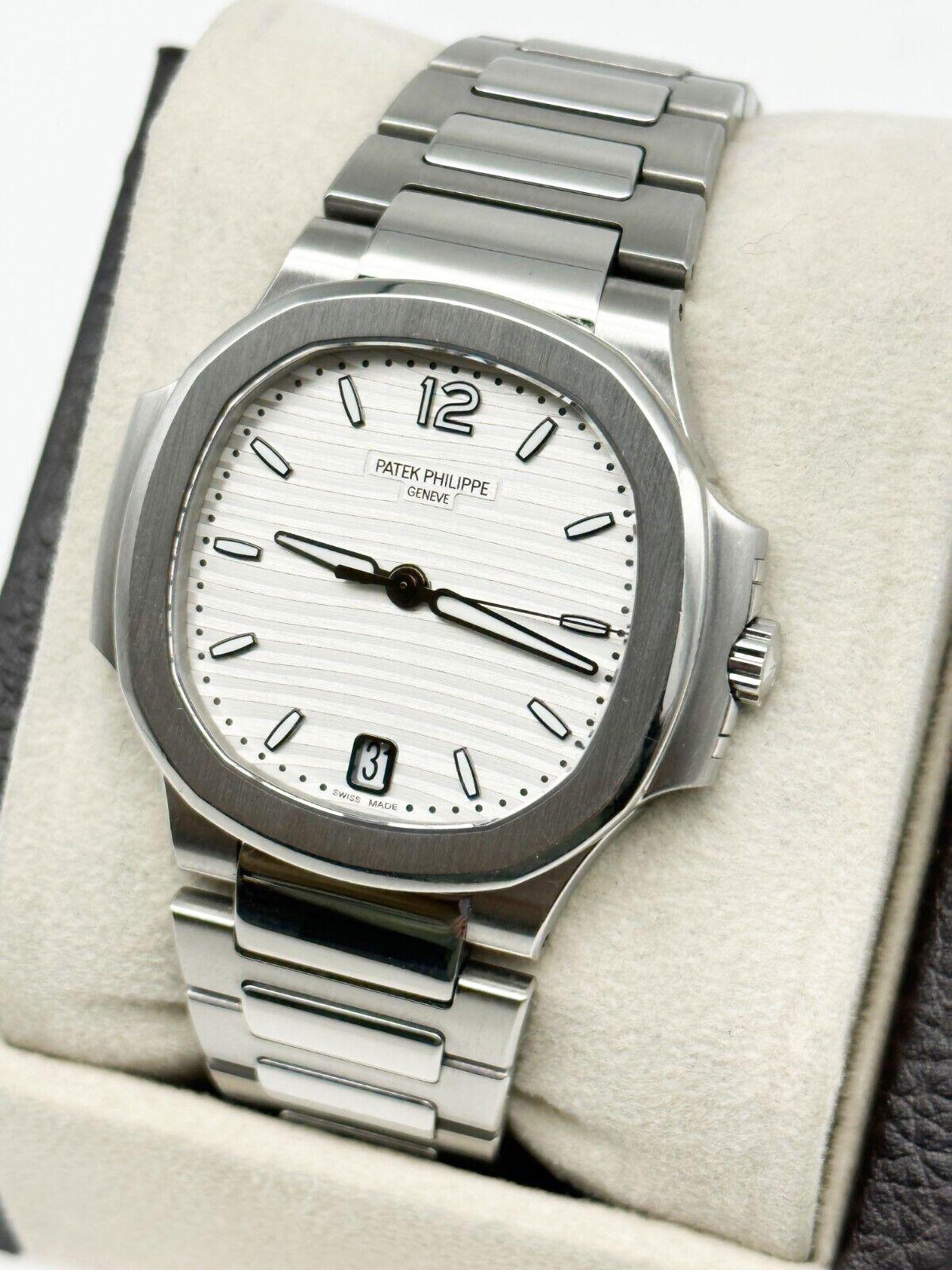 Femenino o masculino Patek Philippe 7118/1A-010 Ladies Nautilus Caja de acero inoxidable Papel