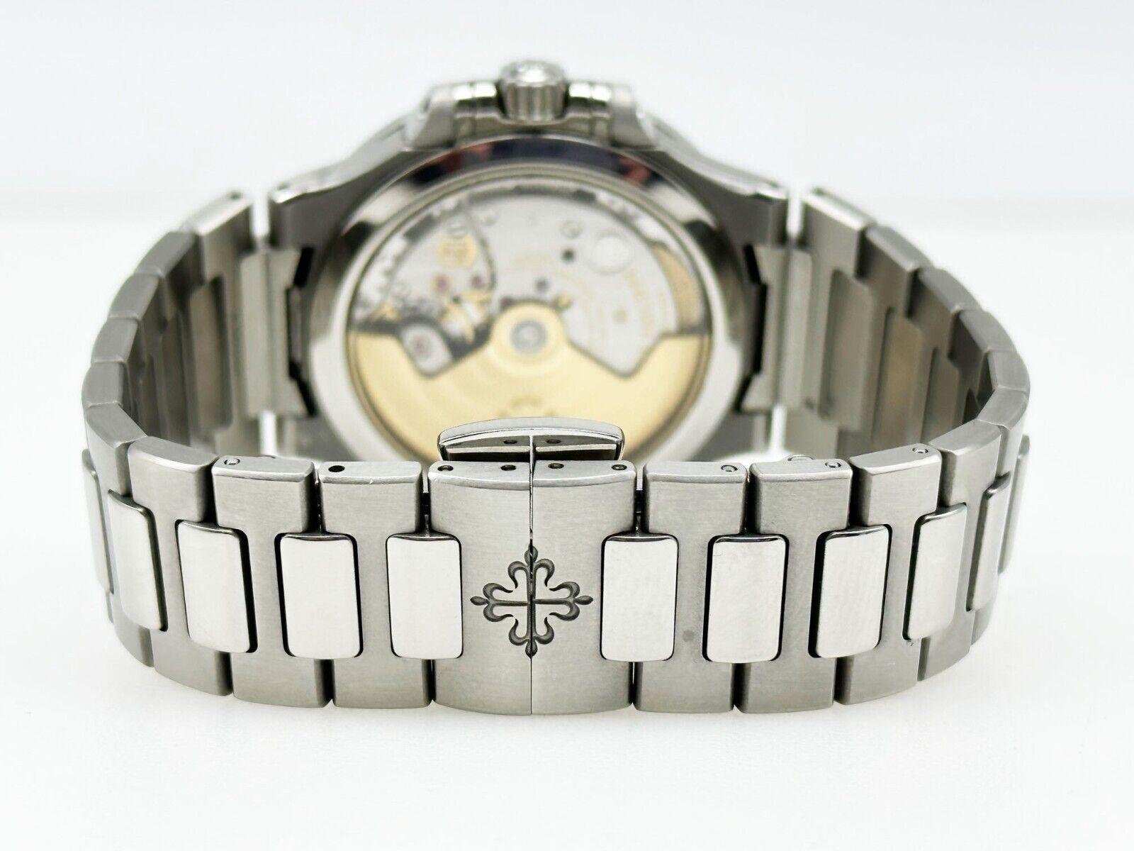 Patek Philippe 7118/1A-010 Ladies Nautilus Caja de acero inoxidable Papel 1