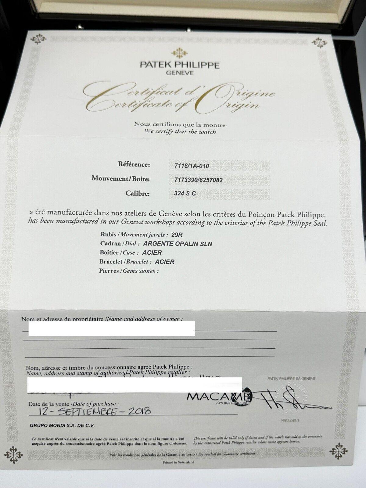 Patek Philippe 7118/1A-010 Ladies Nautilus Caja de acero inoxidable Papel 3