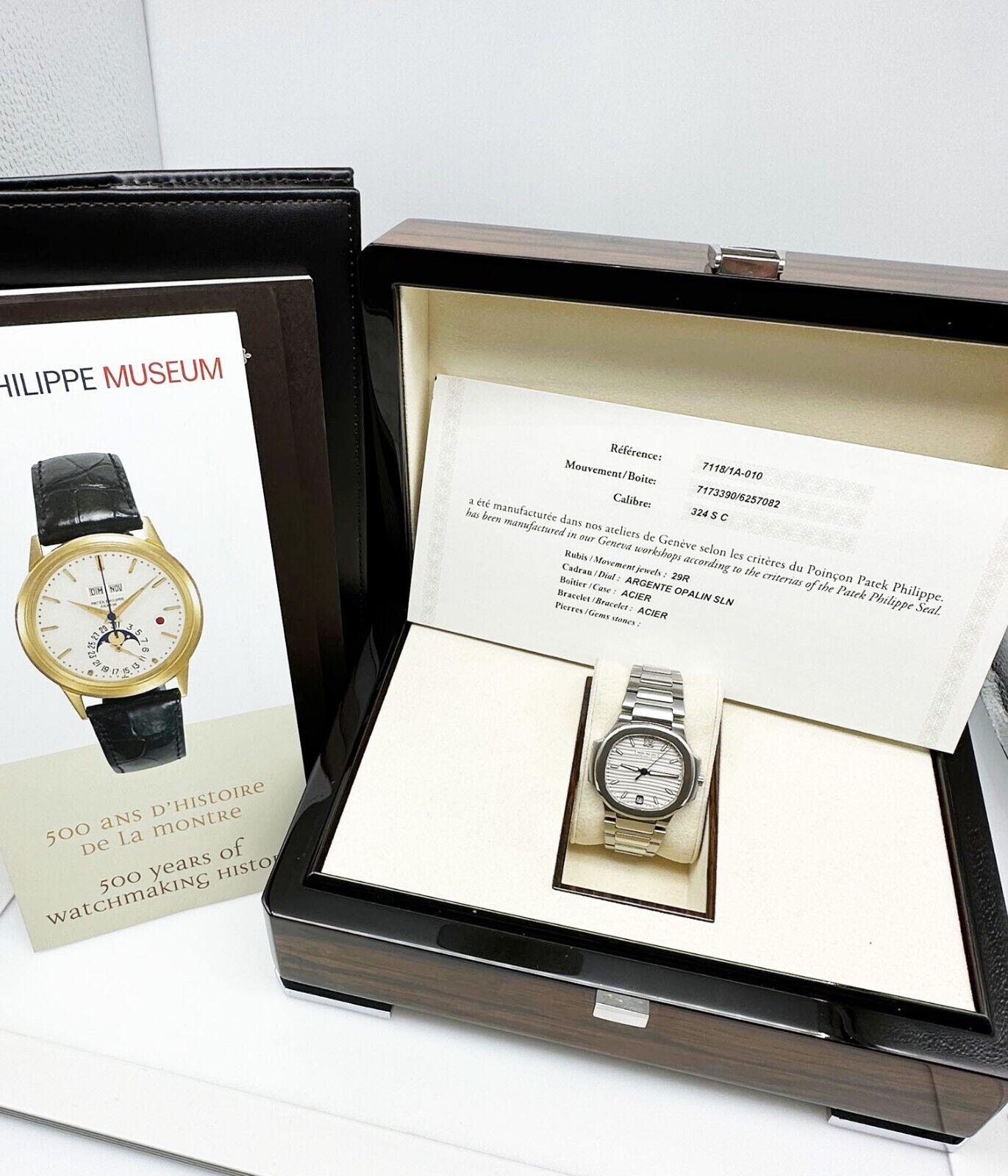 Patek Philippe 7118/1A-010 Ladies Nautilus Caja de acero inoxidable Papel 4