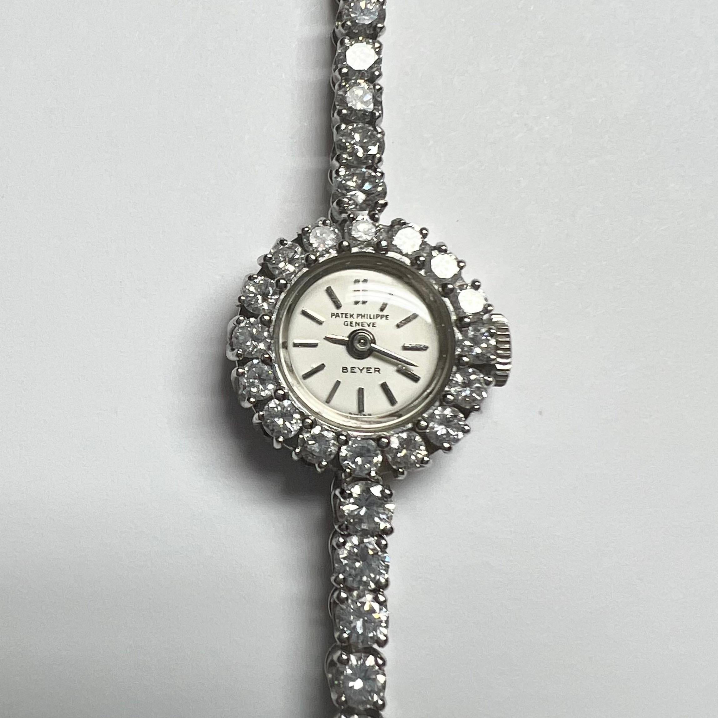 950 platinum and brilliant-cut diamond ladies wrist watch by Patek Philippe for Beyer, circa 1950s.

Elegant ladies wrist watch, the bracelet designed as a graduated line of 52 brilliant-cut diamonds, round case, the bezel decorated with 16