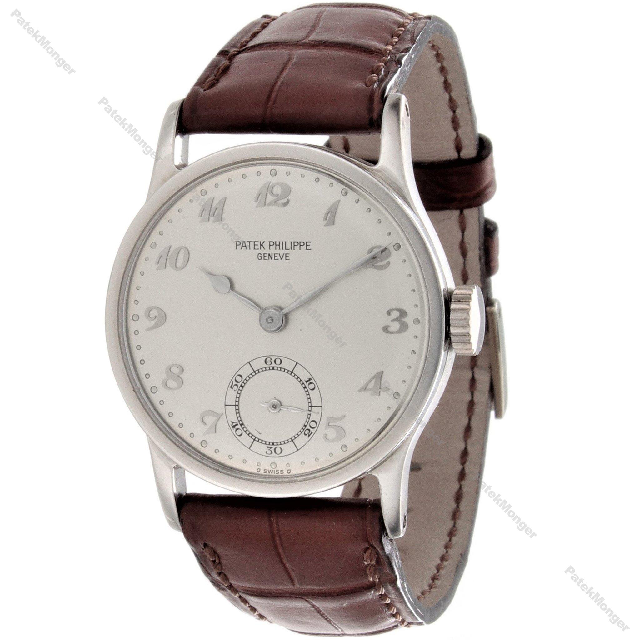 Introduction:
This Patek Philippe 96P Platinum Calatrava watch has a 30.5 mm case with a Breguet silver dial with raised platinum indexes.  The watch is also accompanied with a Patek Philippe buckle and strap.

Date & Paperwork: 
The watch was made