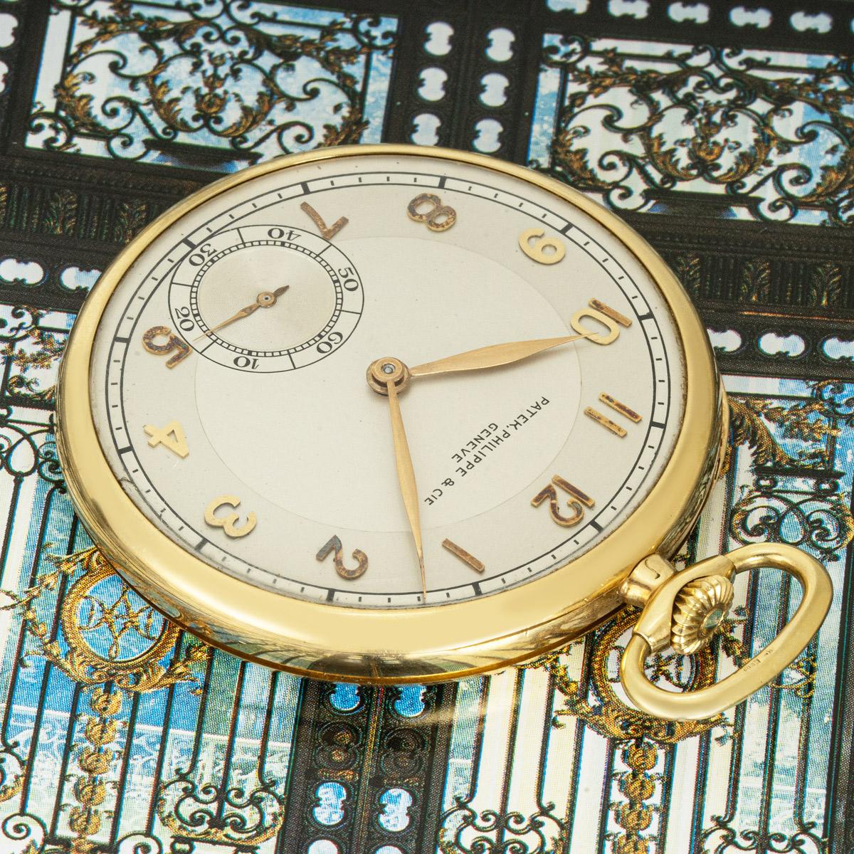 Patek Philippe. An 18ct Yellow Gold Elegant Keyless Lever Dress Pocket Watch C1940s

Dial: The silver two tone matt dial fully signed Patek Philippe & CiE Geneve, with raised rose gold arabic numerals and outer enamelled minute track and with