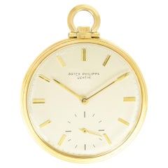 Patek Philippe. A Gold Elegant Pocket Watch & Chain 1960