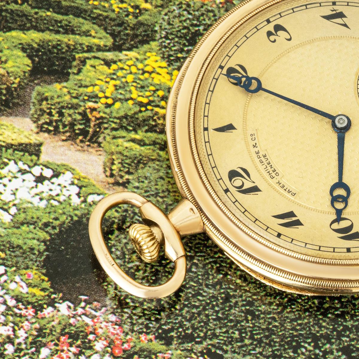 Patek Philippe. A 14ct Yellow Gold Keyless Lever Louis XVI Style Open Face Pocket Watch C1914

Dial: The unusual silver gilt engine turned dial signed Patek Philippe & Co Geneve with Breguet numerals outer minute track and subsidiary seconds dial at