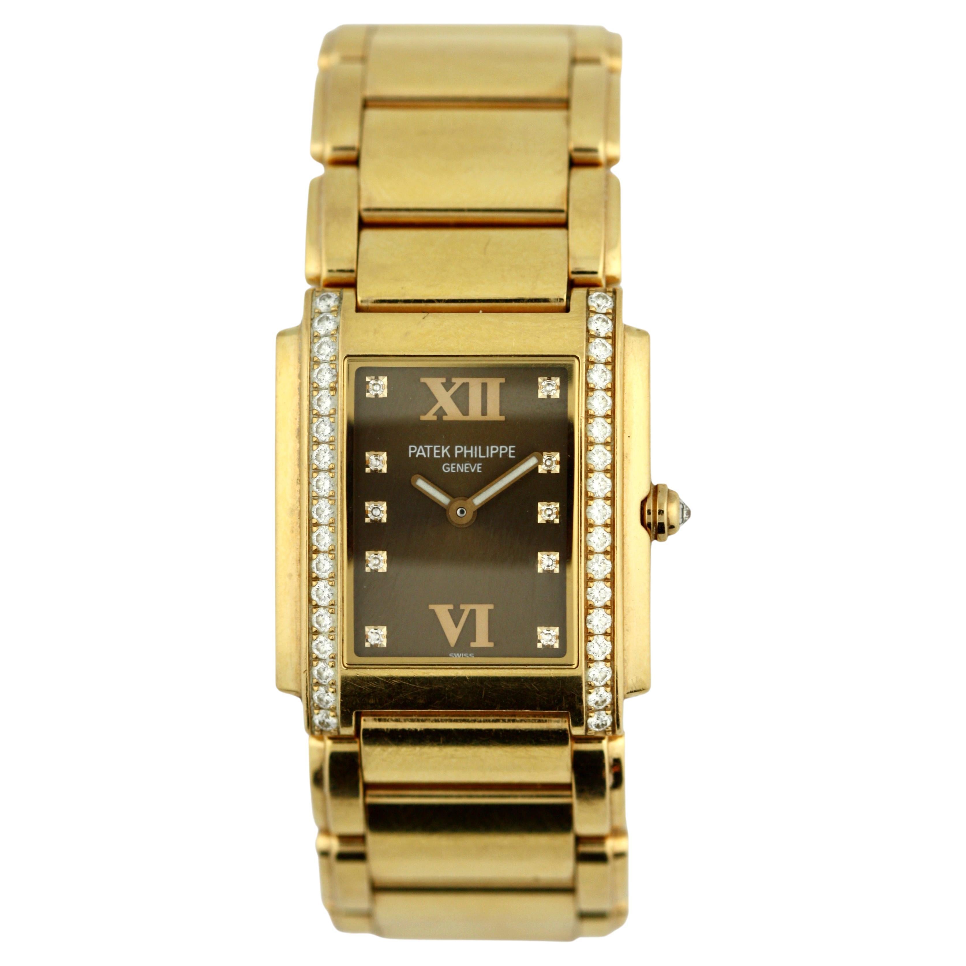 Patek Philippe a Lady's 18K Gold Diamond-Set Rectangular Bracelet Wristwatch