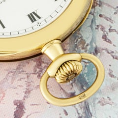 Patek Philippe. A Rare Gold Open Face Pocket watch and Chain C1890