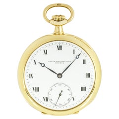 Patek Philippe. A Rare Gold Open Face Pocket watch and Chain C1890