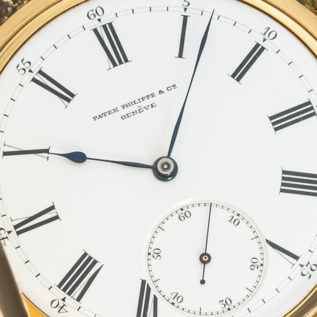 Patek Philippe 18kt Rose Gold Keyless Lever Full Hunter Pocket Watch C1900s.

Dial: The white enamel dial fully signed Patek Philippe & Co Geneve with Roman numerals outer minute track and subsidiary seconds dial at six o'clock. The original blued