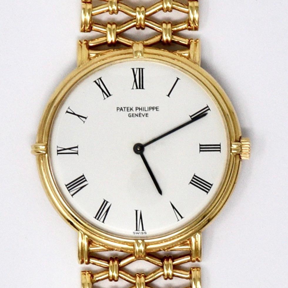 Classical Roman Patek Philippe, A Very Rare Calatrava 18K Yellow Gold Bracelet Watch, Ref 3821/1 For Sale