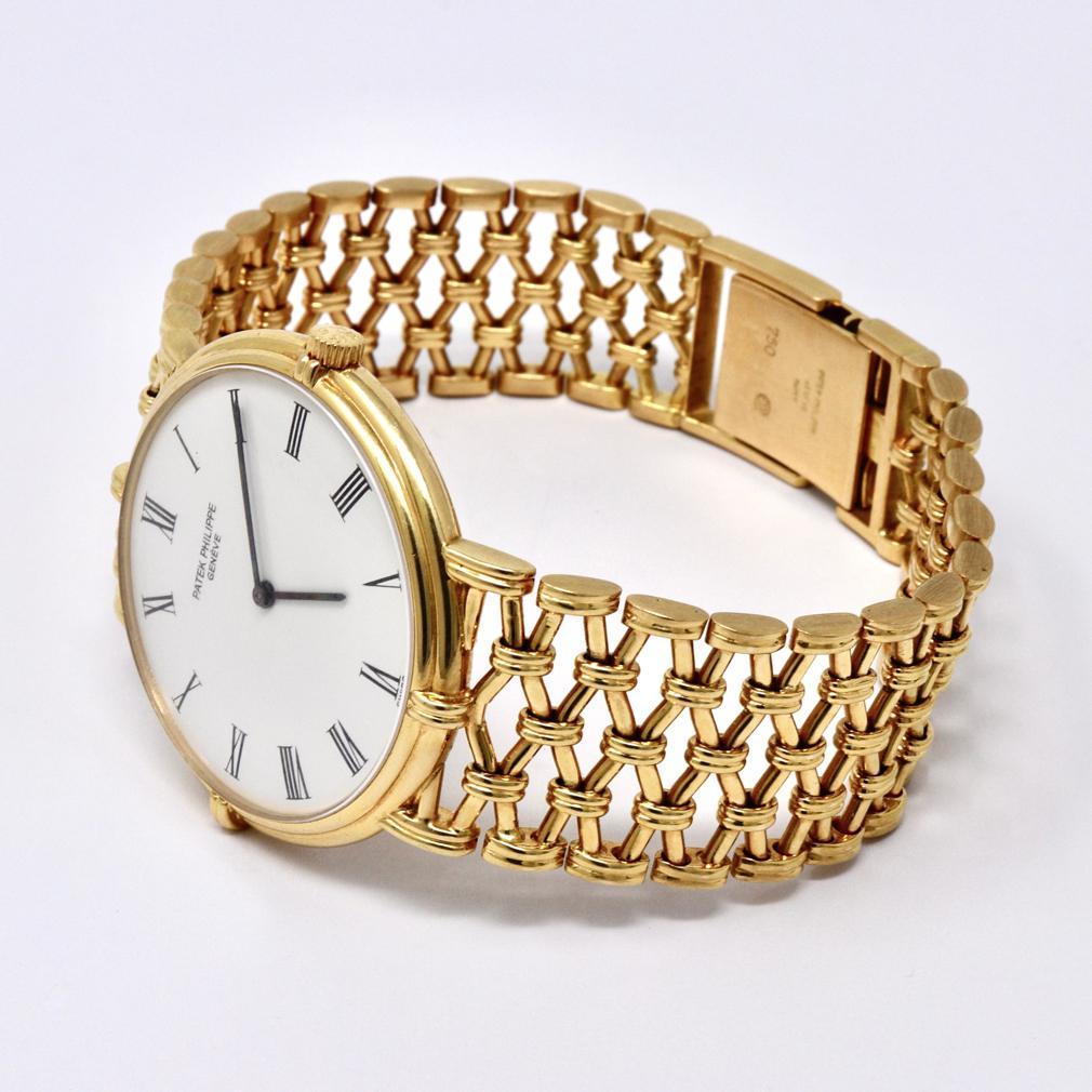 Patek Philippe, A Very Rare Calatrava 18K Yellow Gold Bracelet Watch, Ref 3821/1 In Excellent Condition For Sale In Point Richmond, CA