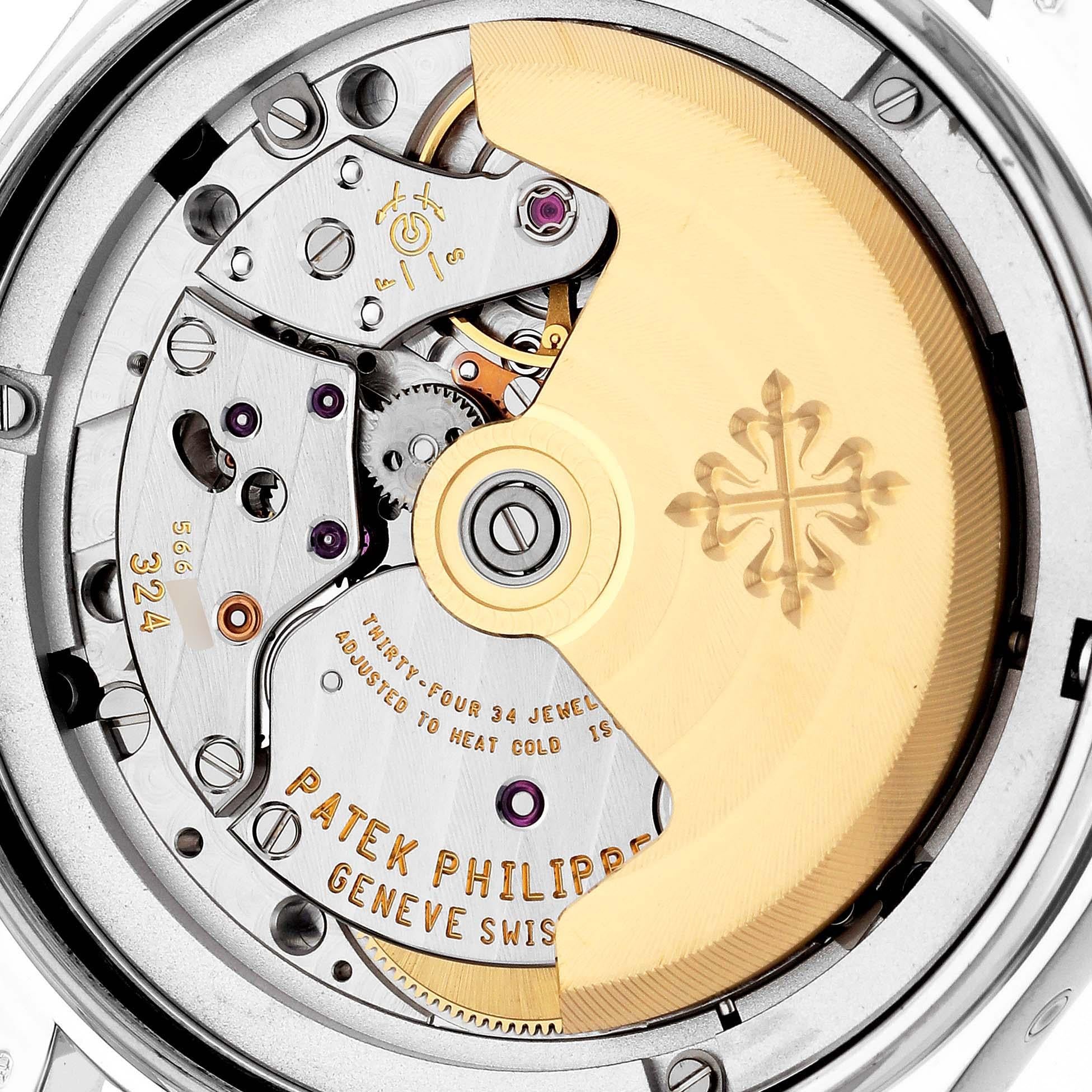 Patek Philippe Annual Calendar White Gold Mother of Pearl Diamond Mens Watch 4936 Box Papers. Automatic self-winding movement. Rhodium-plated, fausses cotes decoration, straight-line lever escapement, Gyromax balance adjusted to heat, cold,