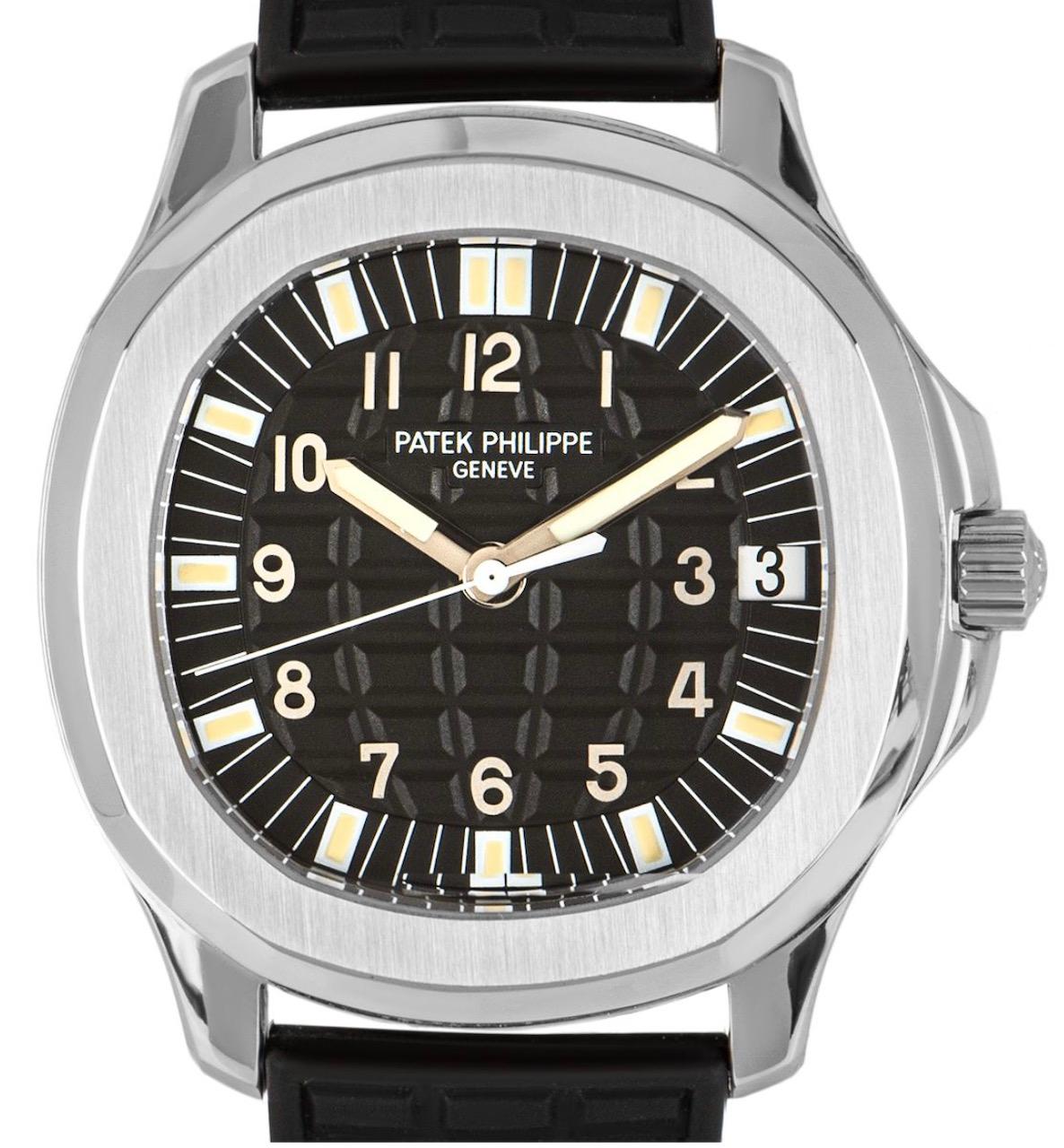 A stainless steel Aquanaut by Patek Philippe, featuring a black embossed dial with a date display at 3 o'clock. An original black rubber strap equipped with a double deployant clasp. Fitted with a sapphire crystal and a self-winding automatic