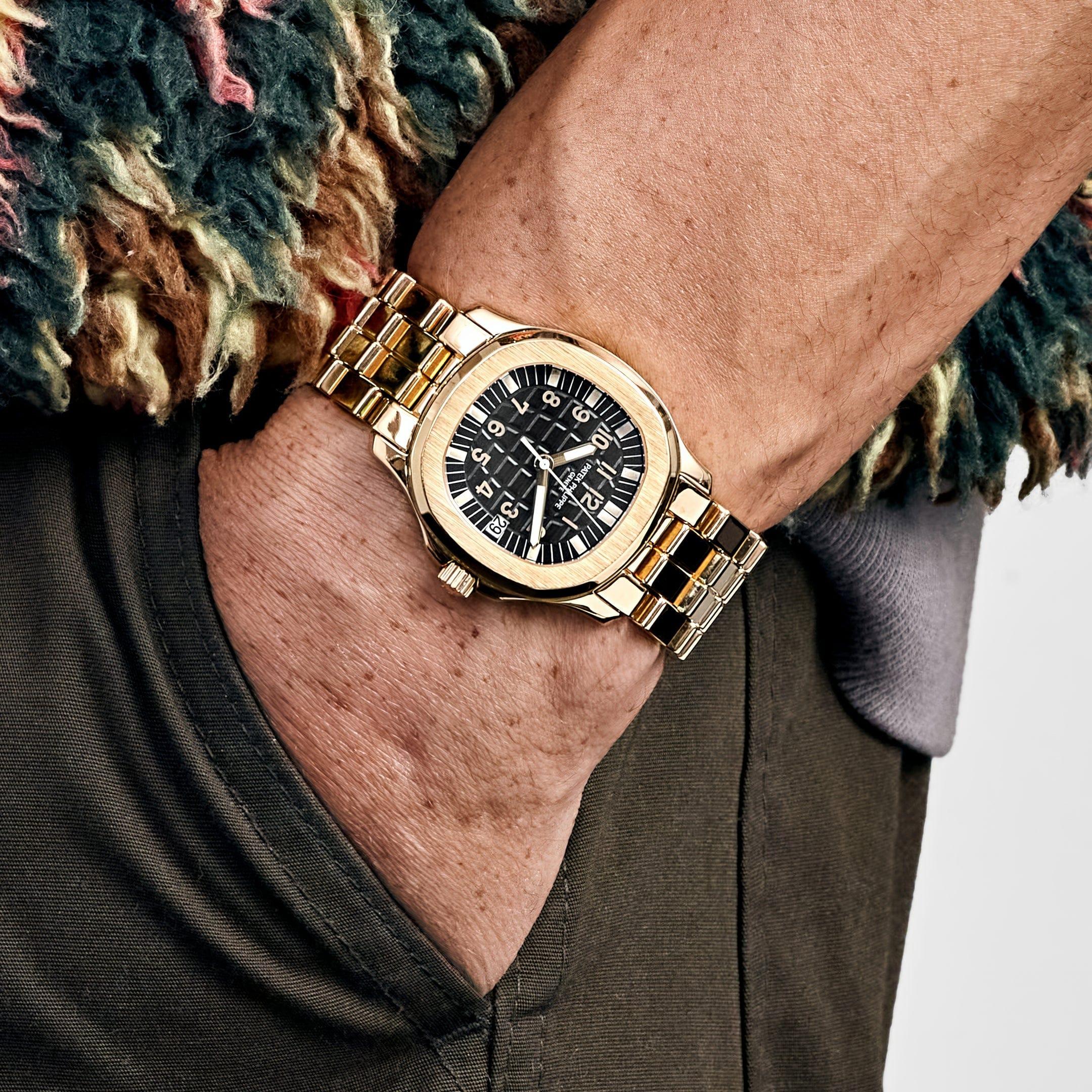 Patek Philippe Aquanaut 5066/1J Yellow Gold Black Dial In Excellent Condition For Sale In New York, NY