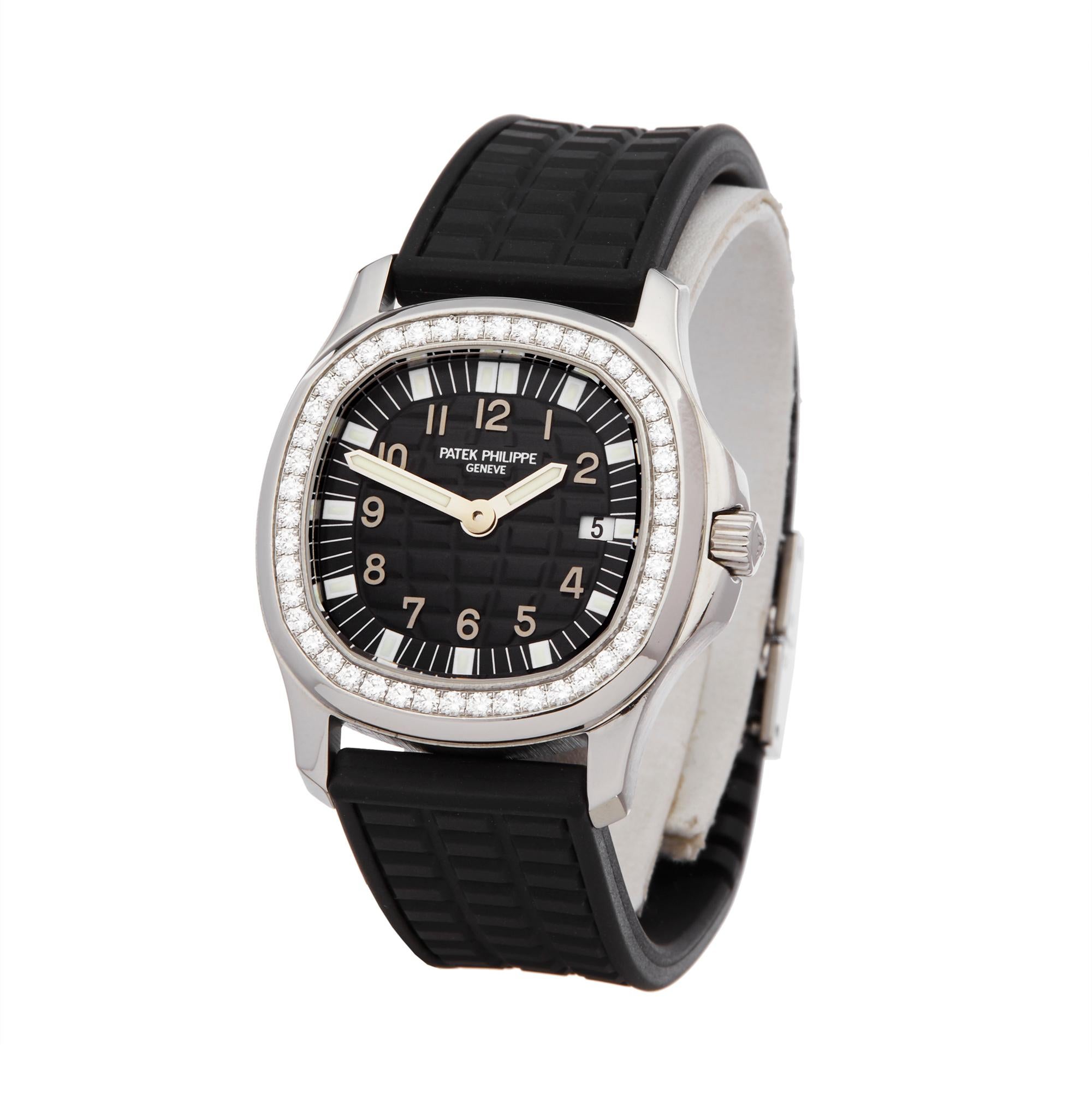 Ref: W6210
Manufacturer: Patek Philippe
Model: Aquanaut 
Model Ref: 4961A
Age: Circa 2000's
Gender: Ladies
Complete With: Box Only 
Dial: Black Arabic
Glass: Sapphire Crystal
Movement: Quartz
Water Resistance: To Manufacturers Specifications
Case: