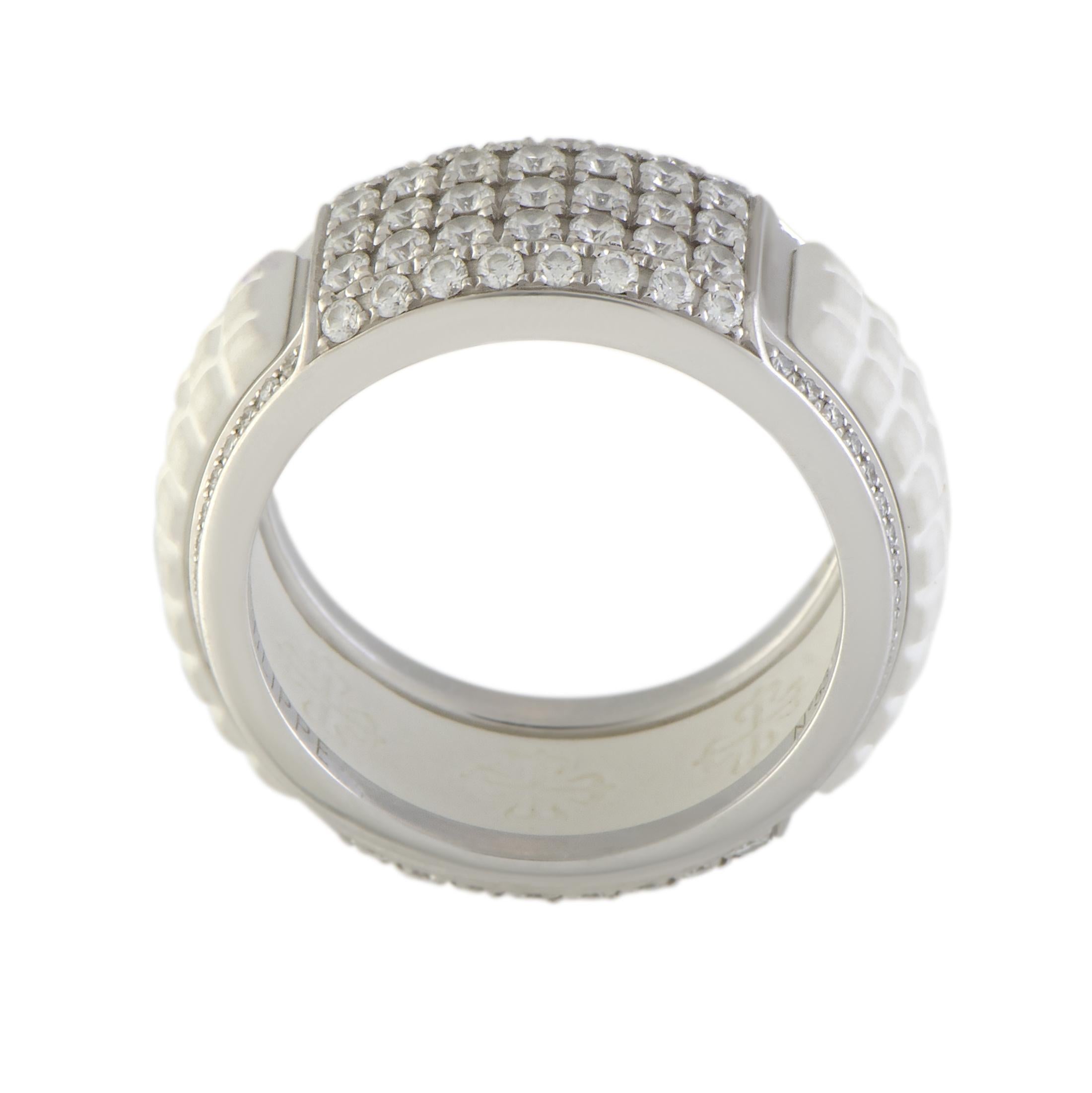 The incredibly unconventional combination of white rubber and 18K white gold is featured in this exceptional ring, creating a stunningly offbeat sight. The ring is a Patek Philippe design and it is lavishly decorated with a plethora of resplendent
