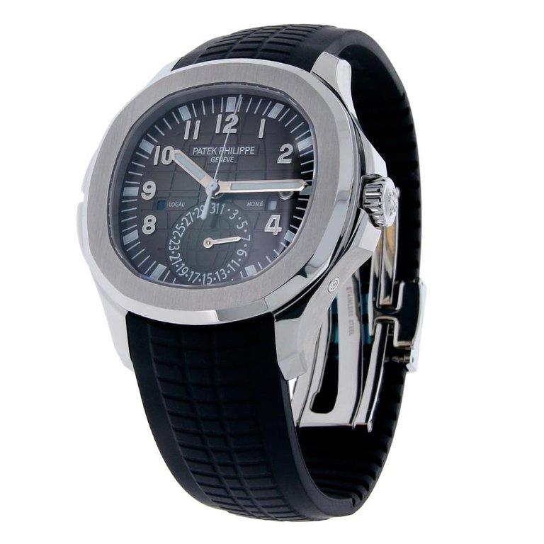 Patek Philippe Aquanaut Reference #:5164A. The Patek Philippe Aquanaut Travel Time in stainless steel, the travelling man's watch. This elegant watch case measures 40 mm made from stainless steel and holds the Patek Philippe Caliber 324 S C FUS self