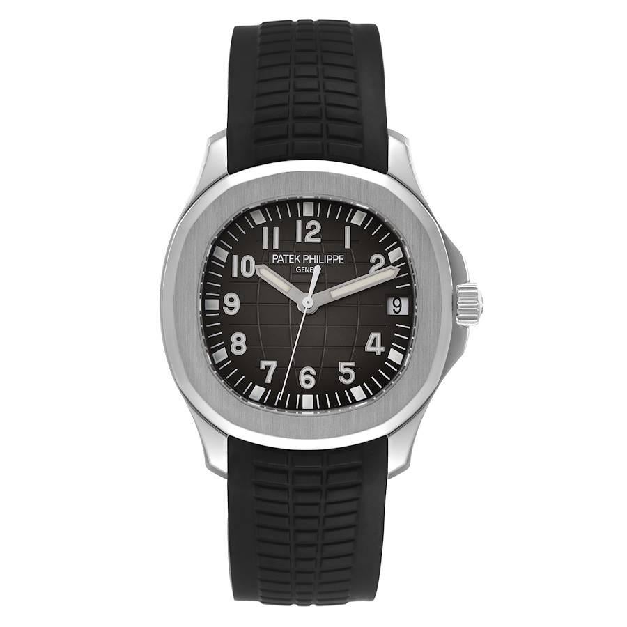 Patek Philippe Aquanaut Steel Rubber Strap Mens Watch 5165A Box Papers. Automatic movement. Stainless steel case 38 x 38 mm. Transparent exhibition sapphire crystal case back. . Scratch resistant sapphire crystal. Embossed black dial with arabic